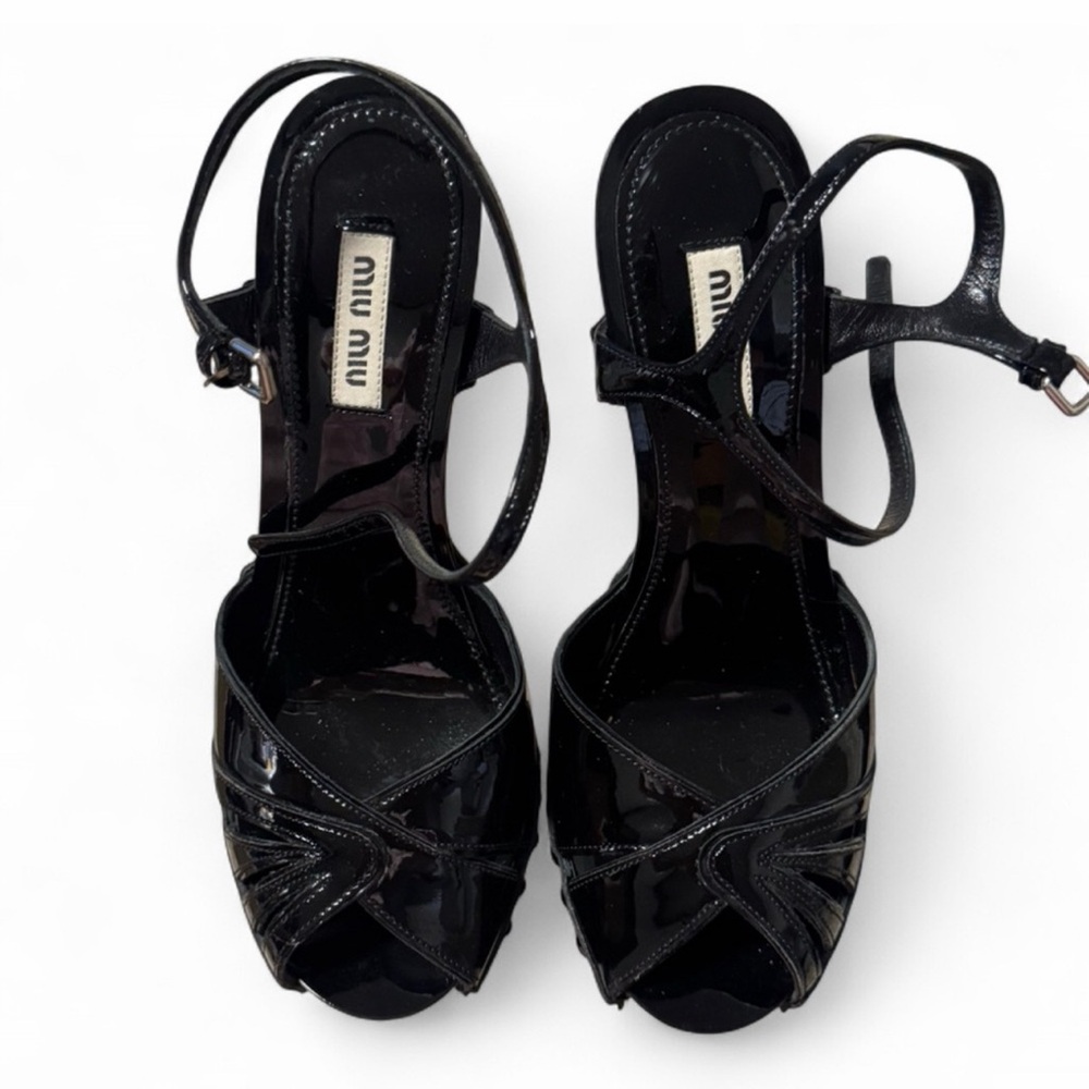 Black Miu Miu pumps for sale. Size 7.5!!